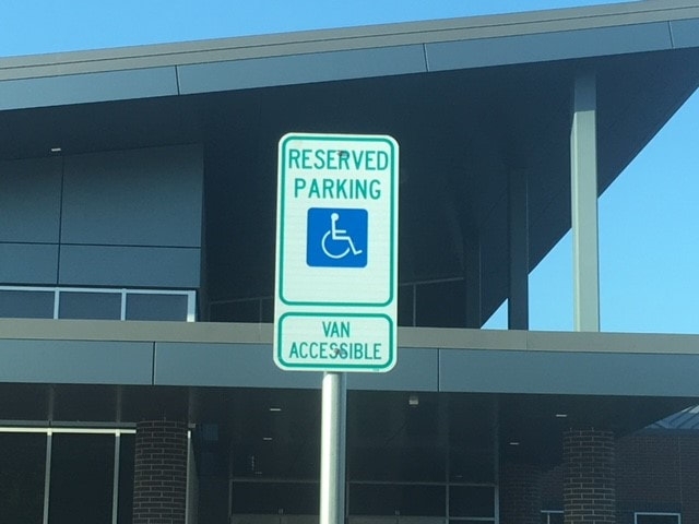 Metal Signage Installed In A Parking Lot Sandy Springs